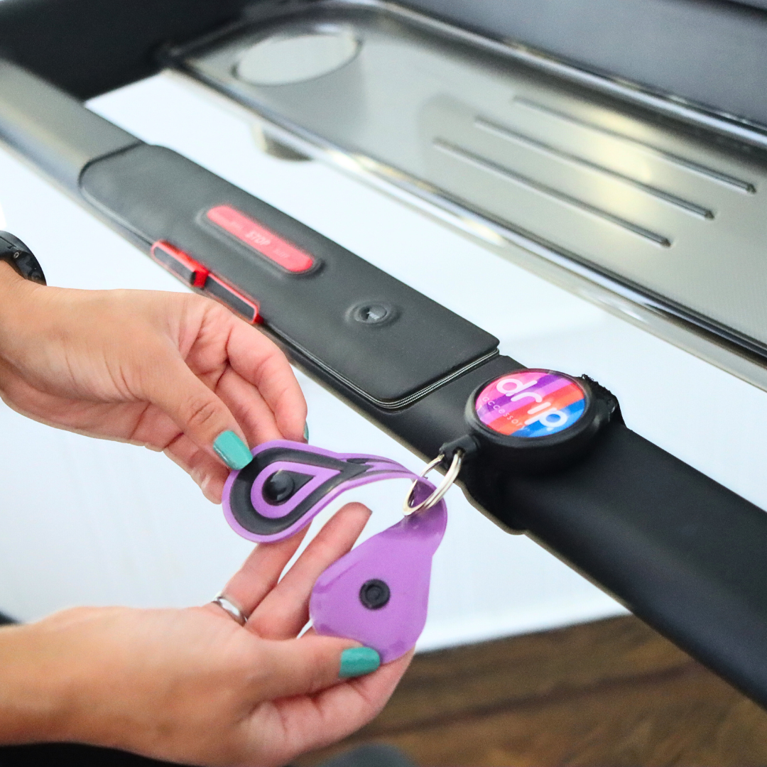 DRIPTOWEL - Retractable Sweat Towel for Treadmills and Spin Bikes
